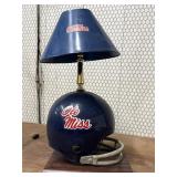 Ole Miss helmet, made into a table lamp. On a