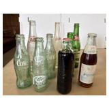 Assortment of soda bottles. Includes 125th