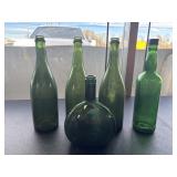 Collection of Green Glass Bottles.