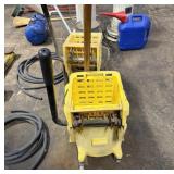 Lot of 2 mop buckets with squeegees and mops