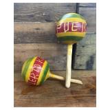 Hand-painted wooden maracas, likely souvenirs,