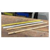 4 Yard Sticks Advertisements
