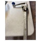 USED INDUSTRIAL CAN OPENER. MOUNTS ON TABLE.