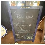 BLUE WOODEN A-FRAME CHALKBOARD ADVERTISING SIGN.