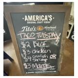 WOODEN A-FRAME CHALKBOARD ADVERTISING SIGN. SEE