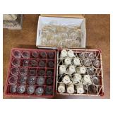 TWO DISHWASHER RACKS AND ONE BOX FULL OF