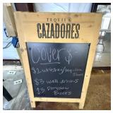 WOODEN A-FRAME CHALKBOARD ADVERTISEMENT SIGN.