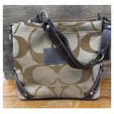 Coach Carly Hobo bag featuring the signature "C"
