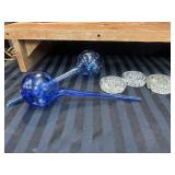 Three Clear Glass Flower Frogs, and Two Blue