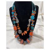 Bold turquoise, coral, and orange beaded necklace