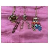 Bundle of 3 owl necklaces and 3 pair of earrings.