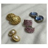 4 sets of clip on earrings. 2 gold tone and 2