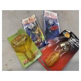 4 Buzz fishing lures in packages. Fishing Tackle.