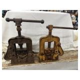 2 Vintage Cast Iron bench-mounting pipe vises.