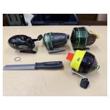 4 Fishing Reels with Zebco File, Zebco Bullet,