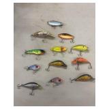 12 Plastic Fishing Lures. Various Brands.
