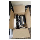 Plastic organizer drawers full of cord laminator