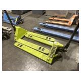 2 CLARK PALLET JACKS. USED. SOLD AS IT IS.