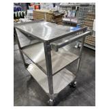 SMALL METAL THREE TIER PUSH CART. USED AND SOLD