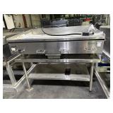 Vulcan brand commercial kitchen gas griddle.