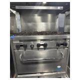 CASTLE SIX BURNER GAS STOVE . UNTESTED. USED AND