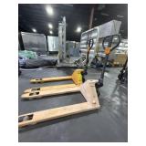 2 GLOBAL INDUSTRIAL PALLET JACKS.