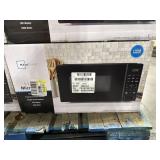 New in box Mainstays microwave. 1.1 cu. ft. 1000