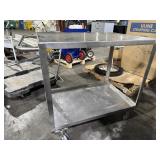 ULINE METAL PUSH CART. TWO SHELVES. SEE PHOTOS