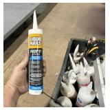 Crate of liquid nails Caulking
