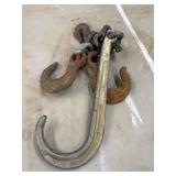 Bundle of industrial tow hooks and a chain