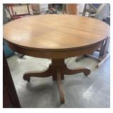 Vintage Oak pedestal dining table, with Wheels.