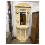 Vintage-style hall tree featuring a mirror, hooks