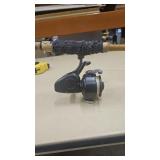 Vintage spinning fishing reel likely a South Bend