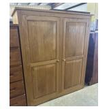 Wooden double-door wardrobe or armoire