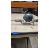 Vintage fishing rod with zebco 202 reel