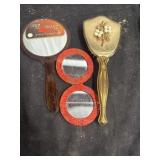 vintage gold-tone vanity hand mirror from the