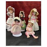 A collection of porcelain dolls.