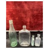 4 vintage glass items include a green "COLA" soda