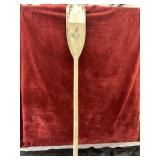 vintage wooden canoe paddle.