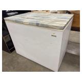 Compact chest freezer that has been customized