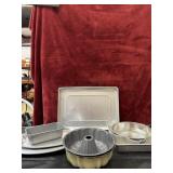 Set of silver pans and platters, Bundt cake