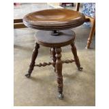 Antique oak swivel piano stool with glass ball