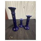 Vintage celestial-themed candlestick holders in a