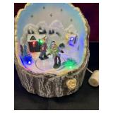 4 pc. Ceramic Christmas cottages and musical
