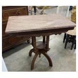 Victorian-style Eastlake marble top parlor table,