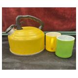 Whistling tea kettle With two little coffee cups