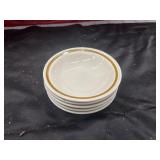 Corelle dinner plates in the Citrus pattern.