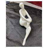 Royal Dux Glazed porcelain figurine of a seated