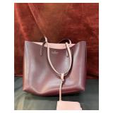 Kate Spade Ava reversible tote.