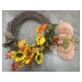 Door hanging wreath for fall season.